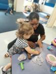 Teacher at playdough